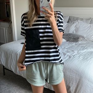 Striped T with oversized faux leather pocket